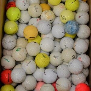 18 assorted golf balls